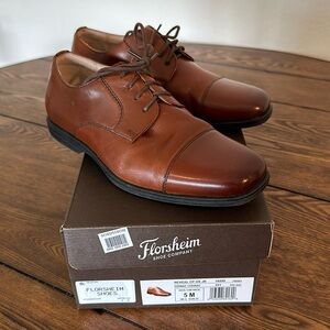Boys size 5 Flosheim dress shoes in cognac brown. Worn once! Come with box!